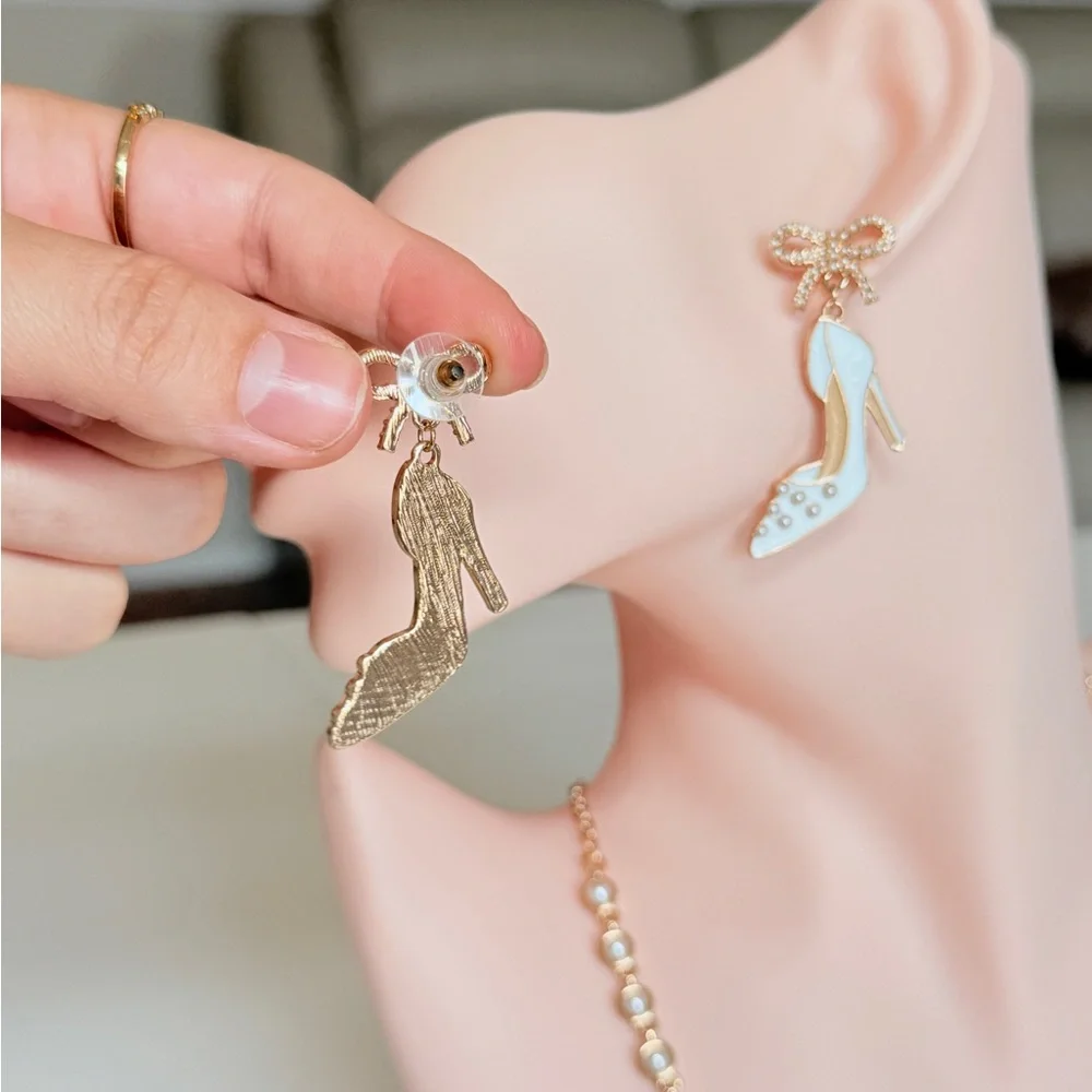 White Enamel High Heel Drop Earrings with Gold Bow